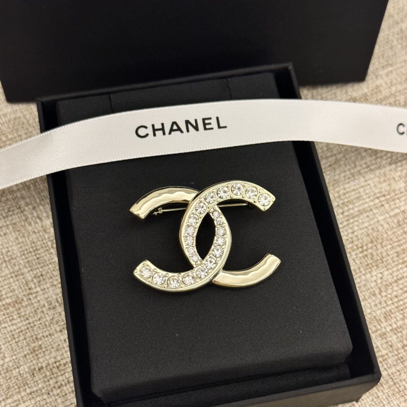Ch*el brooches